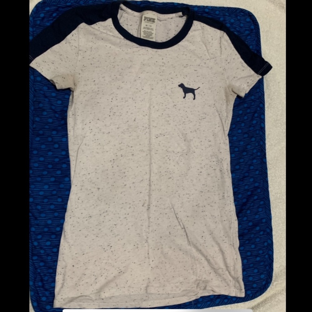 Pink Victoria’s Secret shirt.